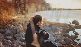 Woman alone on rocks